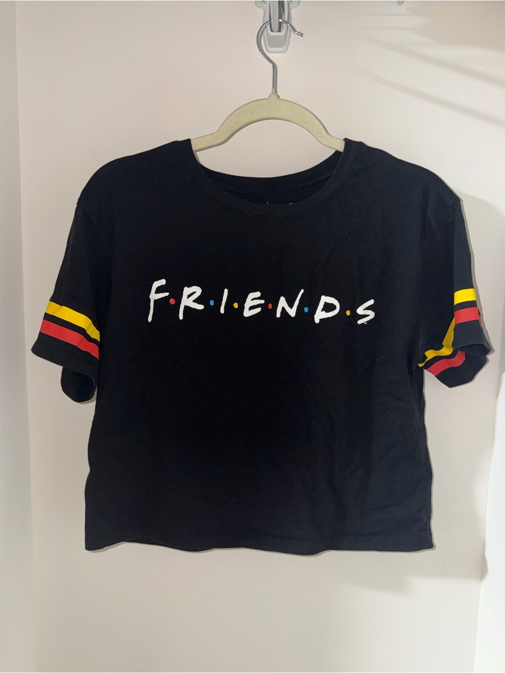 Love Tribe Women’s Black 'FRIENDS' Graphic Tee Stripe Sleeves
